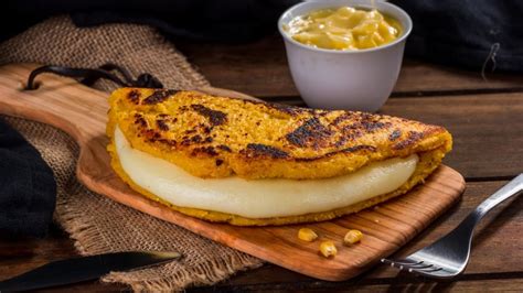 Cachapa (Venezuelan Corn Pancakes) is a popular Venezuelan street food made with ground fresh corn. They are soft on the inside and crispy on the outside and are stuffed with gooey cheese and butter making a delicious …